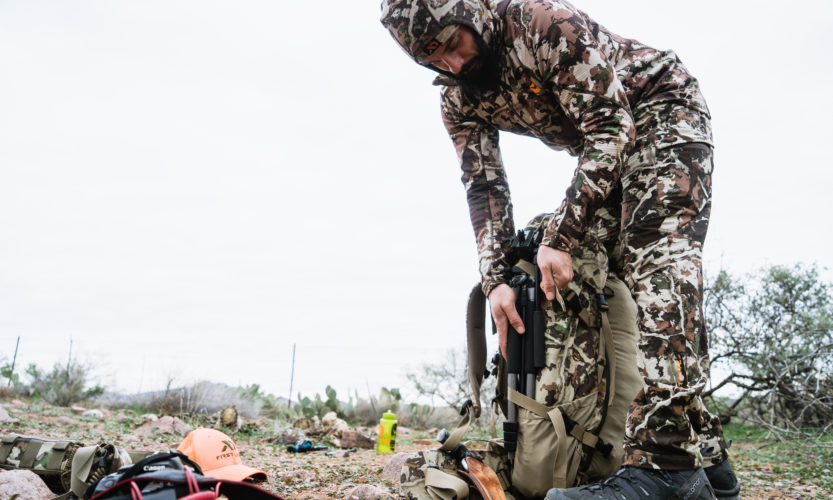 Josh from Dialed in Hunter packing up on a backcountry hunt in Arizona