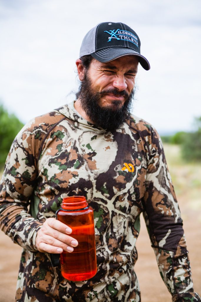 Josh from Dialed in Hunter washing down some Paleo Diet nut butter that didn't agree with him