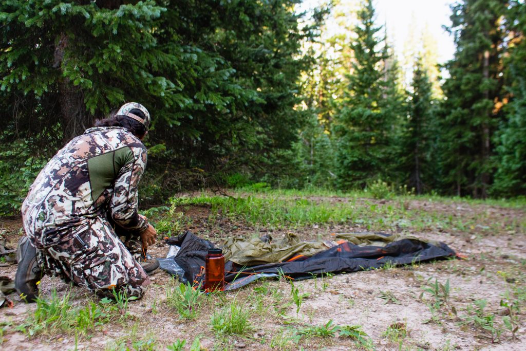 Josh from Dialed in Hunter setting up the Nemo x First Lite Recurve 2p tent