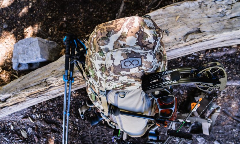 Josh from Dialed in Hunter's Exo mountain gear backpack on a high country mule deer hunt in Colorado