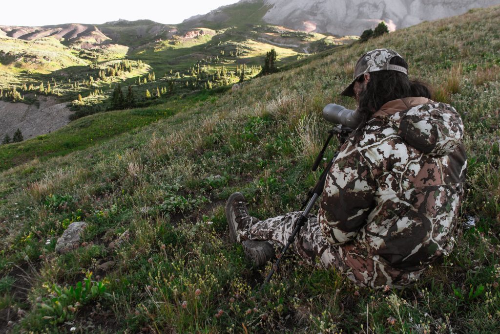 Josh from Dialed in Hunter glassing for mule deer