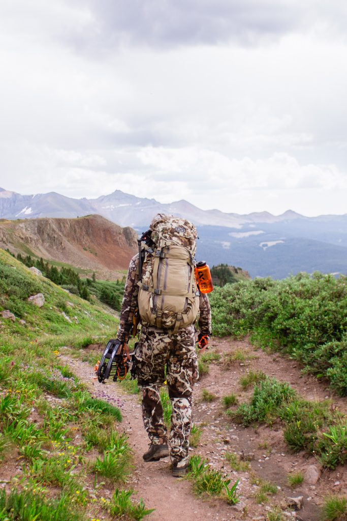 Josh from Dialed in Hunter backpack hunting in Colorado in an area he scouted from a topographic map