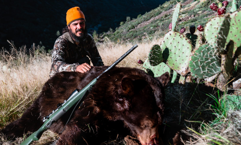 Josh Kirchner from Dialed in Hunter with a Fall Black Bear he harvested in Arizona
