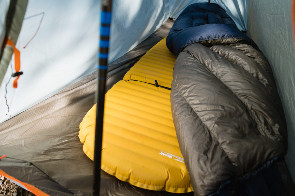 A sleeping pad paired with a quilt on a backpack hunt in Arizona