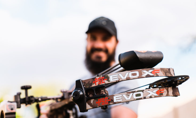 Josh Kirchner from Dialed in Hunter holding the PSE EVO XF 33 bow