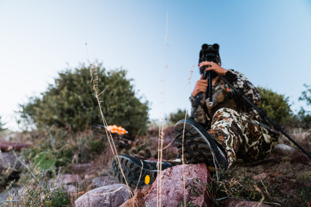 Josh Kirchner glassing on a spot and stalk bowhunting trip in Arizona