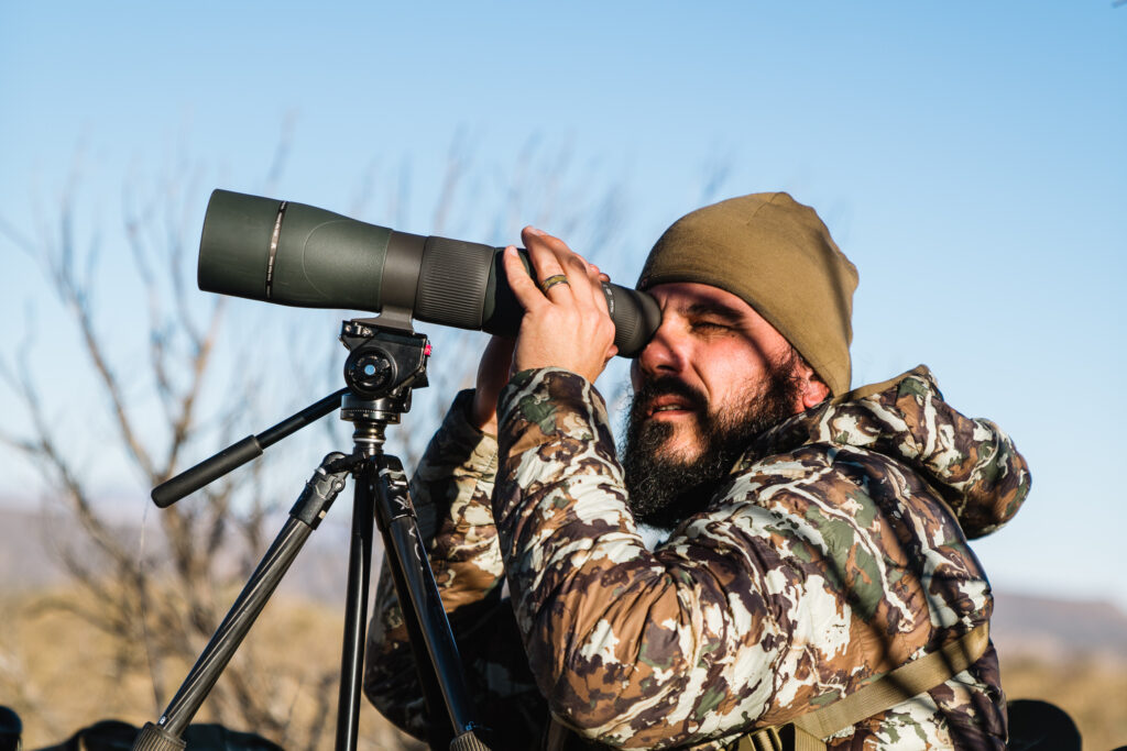 Josh Kirchner glassing for coues deer while bowhunting in Arizona