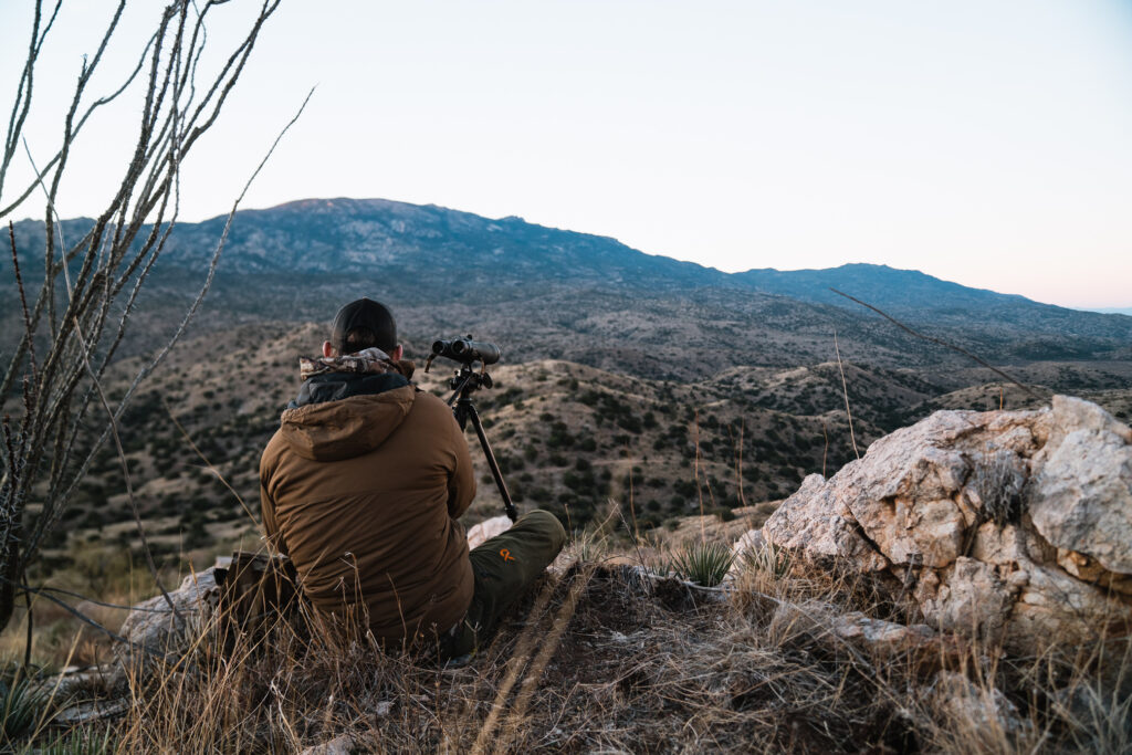Brad Brooks set up on a glassing knob looking for coues deer on a bowhunting trip to Arizona