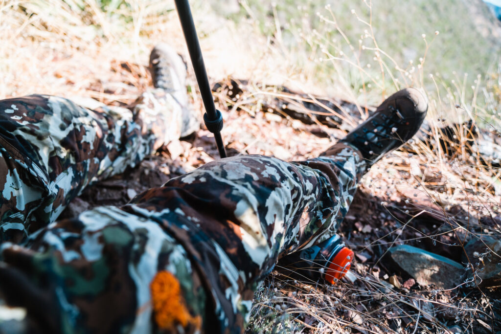 Josh Kirchner from Dialed in Hunter dealing with a muscle cramping on a backcountry hunt in Arizona