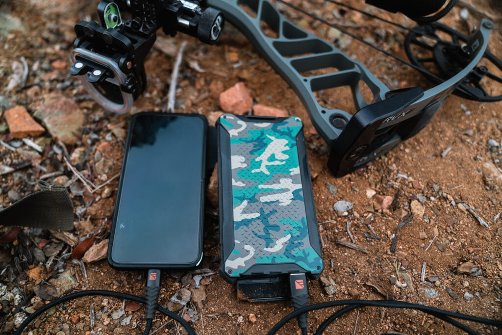 Dark Energy Poseidon Pro charging a smartphone on an archery elk hunt in Arizona