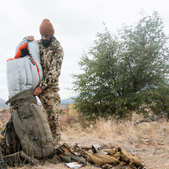 Josh Kirchner from Dialed in Hunter loading a backpack for a backpack hunt in Arizona