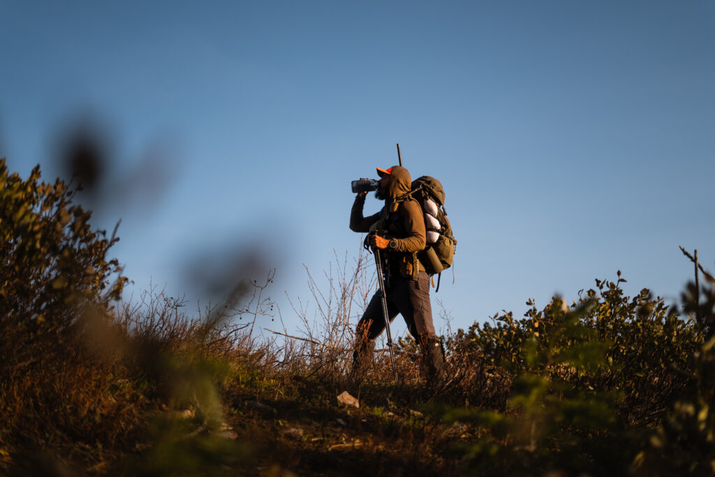 Josh Kirchner from Dialed in Hunter packing out a black bear while backpack hunting for black bears in Idaho.
