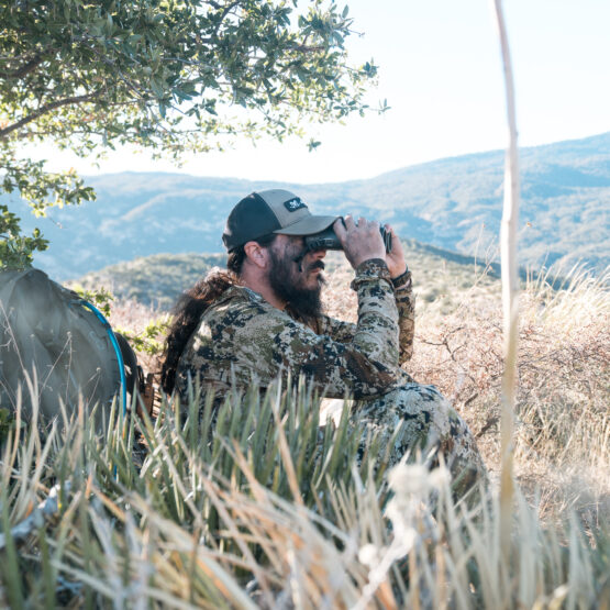 Josh Kirchner glassing the deserts of Arizona for Coues deer with 10x42 binoculars