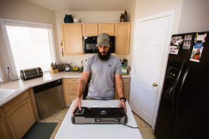 Josh of Dialed in Hunter using the GameSaver Big Game Vacuum Sealer