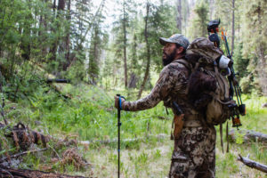 Josh of Dialed in Hunter packing out his archery spring bear in Arizona
