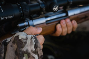 Josh's friend Cody loading a round for a bear hunt here in Arizona