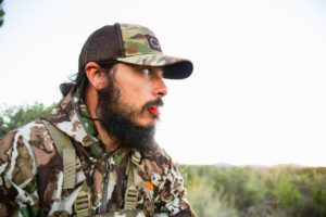 Josh from Dialed in Hunter calling for elk on his archery elk hunt in arizona