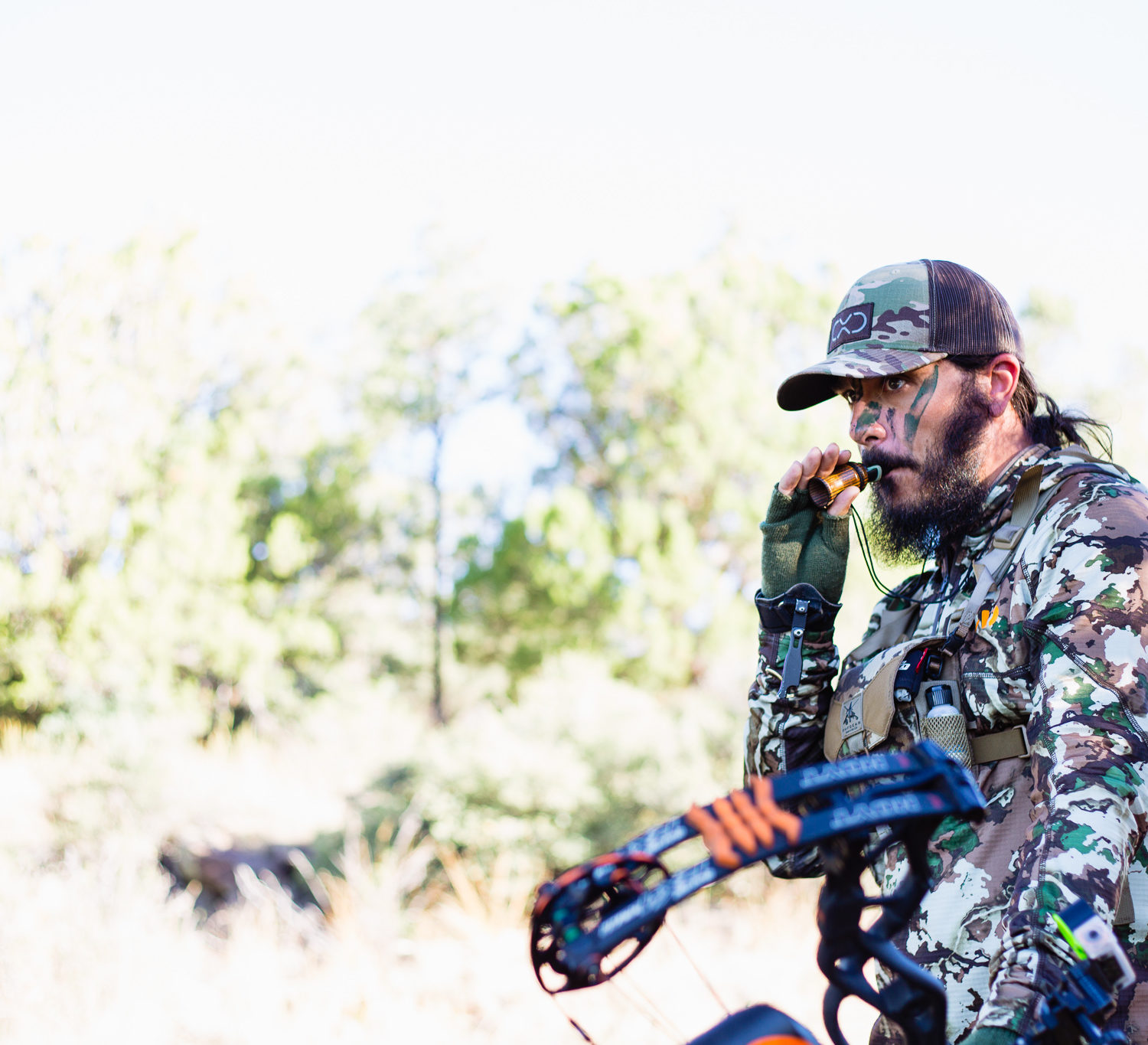 Josh from Dialed in Hunter calling for elk on his archery elk hunt in arizona