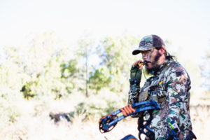 Josh from Dialed in Hunter calling for elk on his archery elk hunt in arizona