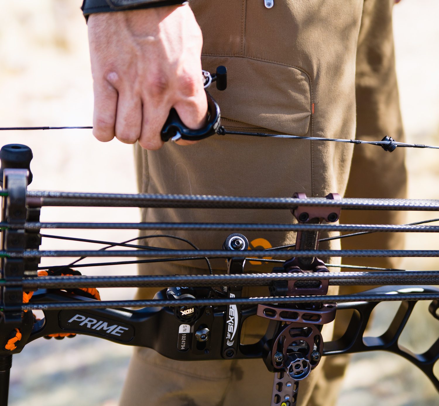 Josh from Dialed in Hunter carrying his bow