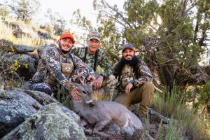 Josh's brother Jake and their Dad with Jake's first deer on a hunt in Arizona