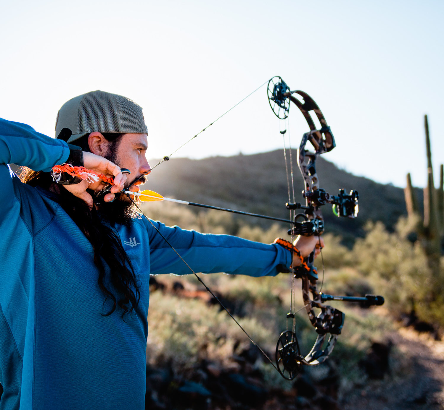Josh Kirchner from Dialed in Hunter shooting his bow with a thumb release aid