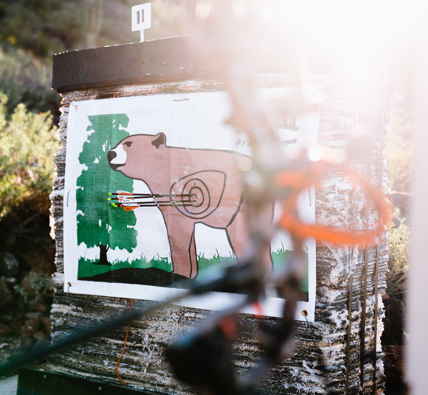 Josh Kirchner's group of arrows sighting in his bow at the archery range