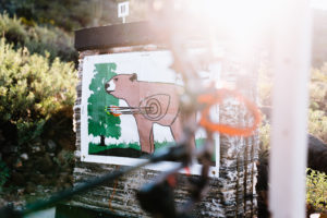 Josh Kirchner's group of arrows sighting in his bow at the archery range