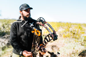 Josh Kirchner from Dialed in Hunter holding his PSE EVO XF 33