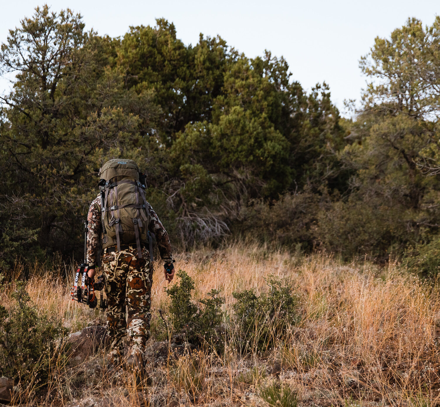 Josh Kirchner from Dialed in Hunter hiking out of the backcountry