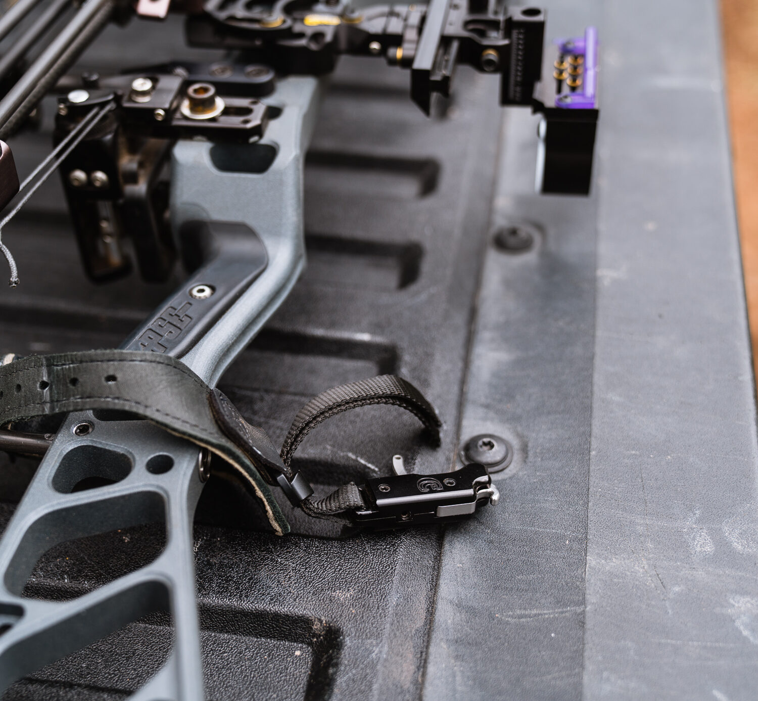 An archery release aid attached to Josh Kirchner's bow from Dialed in Hunter
