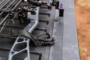 An archery release aid attached to Josh Kirchner's bow from Dialed in Hunter