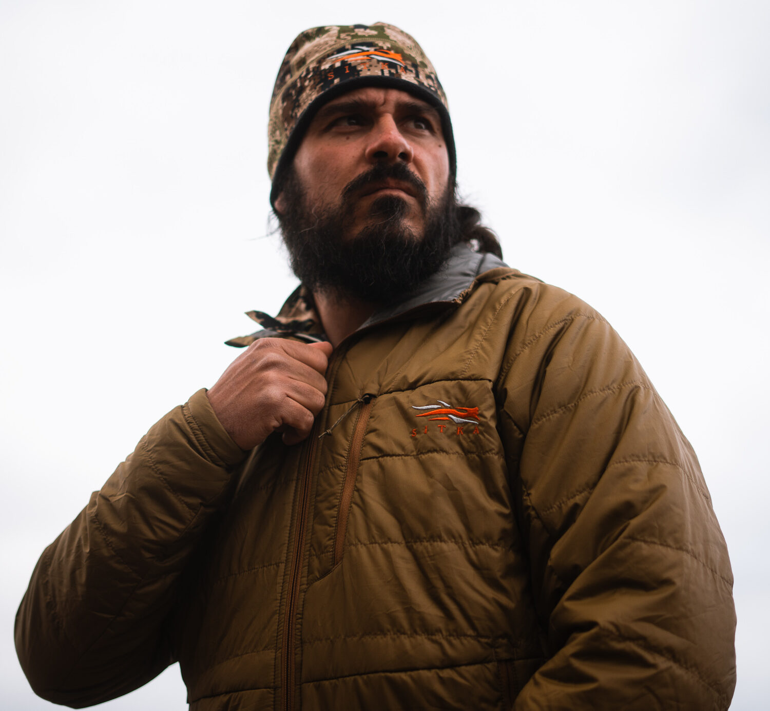 Josh Kirchner layering with Sitka Gear on a backcountry archery hunt in Arizona