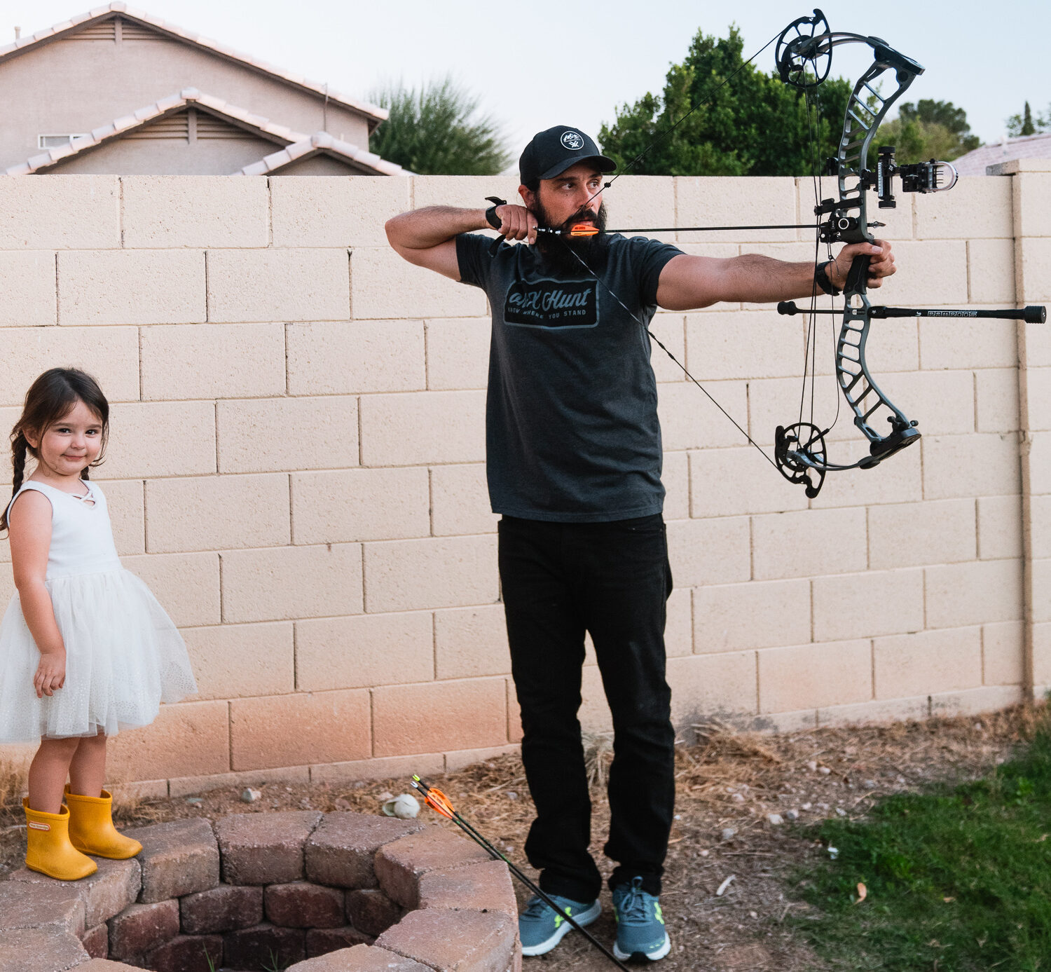 Josh Kirchner from Dialed in Hunter shooting his bow with his daughter