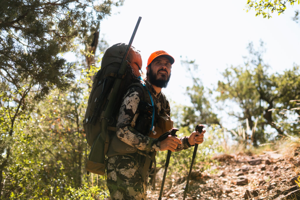 Exo Mountain Gear Rifle Carrier securing rifle to backpack on a Fall bear hunt in Arizona