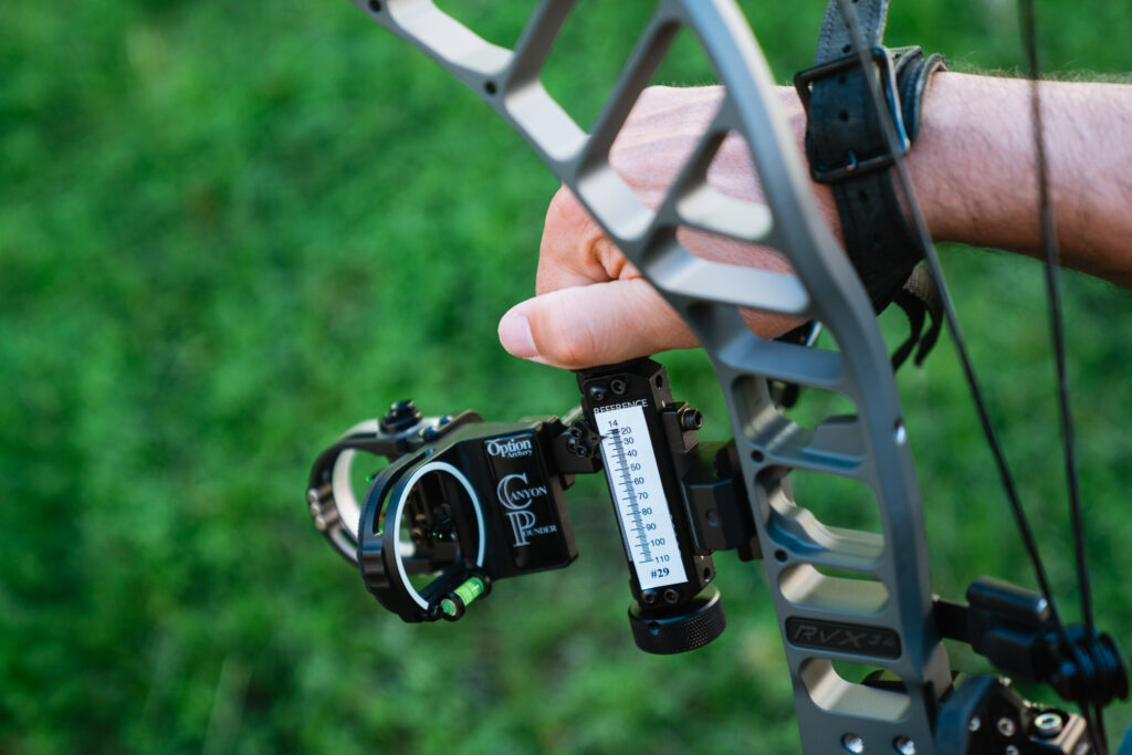 Option Archery Canyon Pounder bow sight being dialed to exact yardage