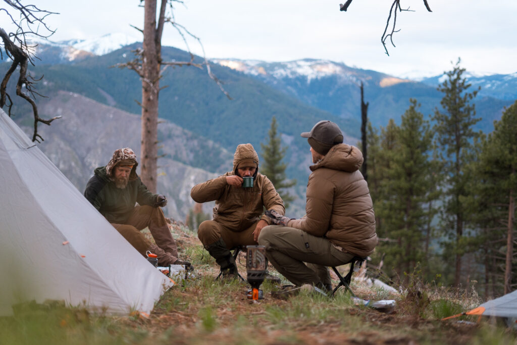 Josh Kirchner and hunting partners enjoying some camp time on a backpack hunt for black bears in Idaho