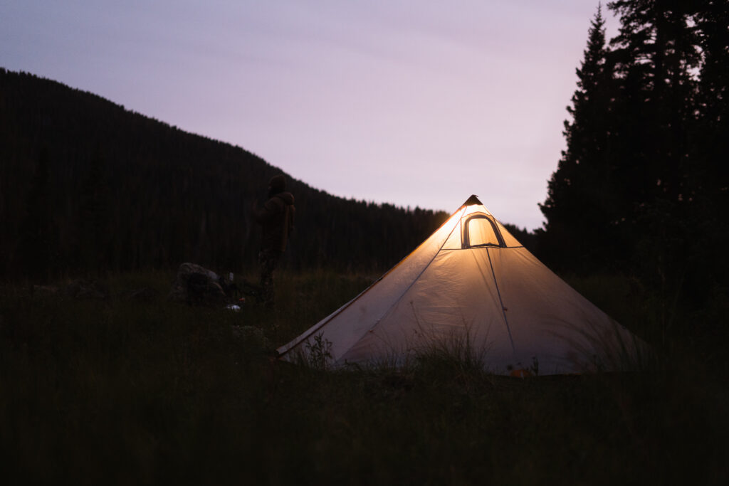 A tipi tent set up in the backcountry of Colorado on a backpack hunt for elk