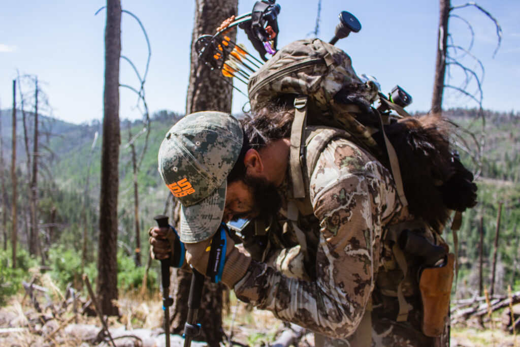 Josh Kirchner packing out an archery black bear in Arizona