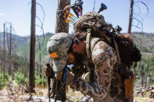 Josh Kirchner packing out a black bear he harvested with his bow in Arizona