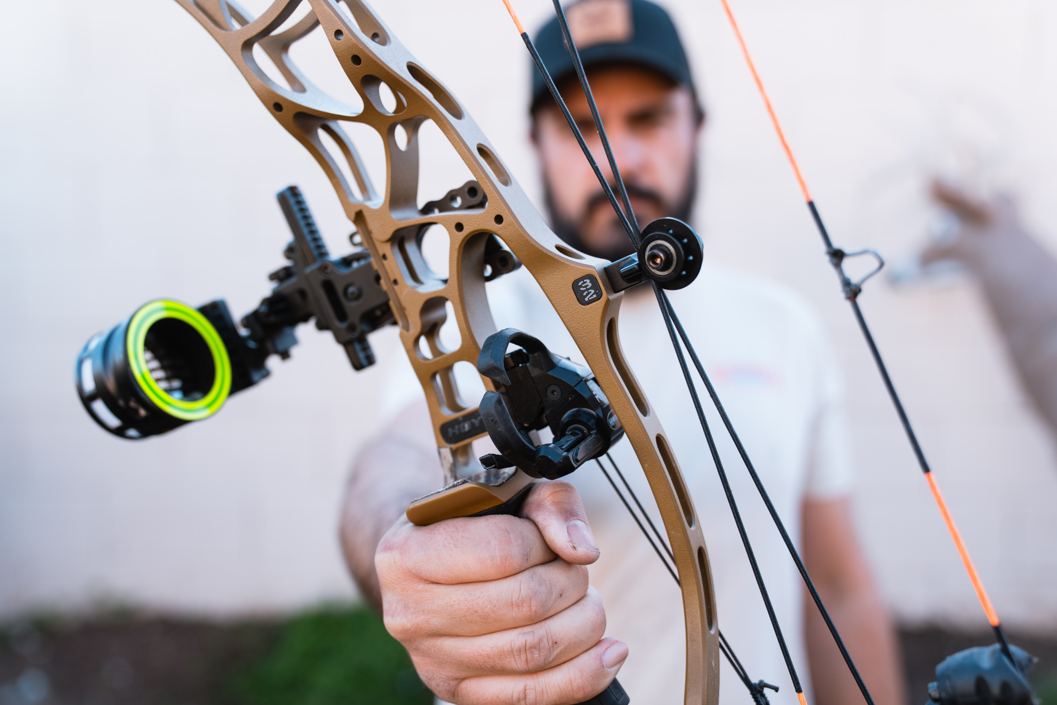 Josh Kirchner holding his Hoyt AX-2 bow for hunting