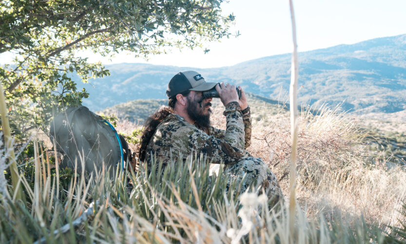 Josh Kirchner glassing the deserts of Arizona for Coues deer with 10x42 binoculars