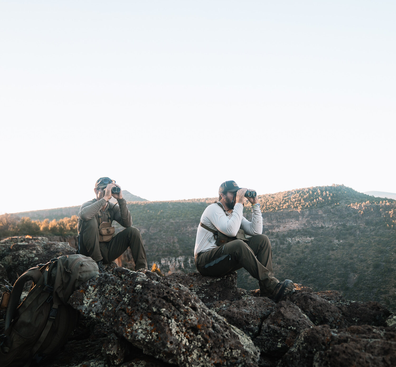 Josh Kirchner from Dialed in Hunter with his hunting partner glassing for bears in Arizona on a scouting trip