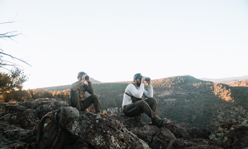Josh Kirchner from Dialed in Hunter with his hunting partner glassing for bears in Arizona on a scouting trip