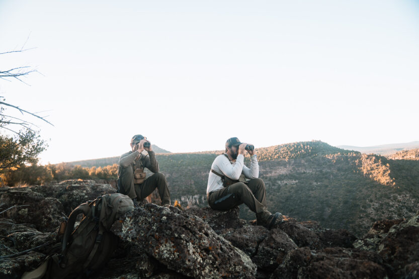 Josh Kirchner from Dialed in Hunter with his hunting partner glassing for bears in Arizona on a scouting trip