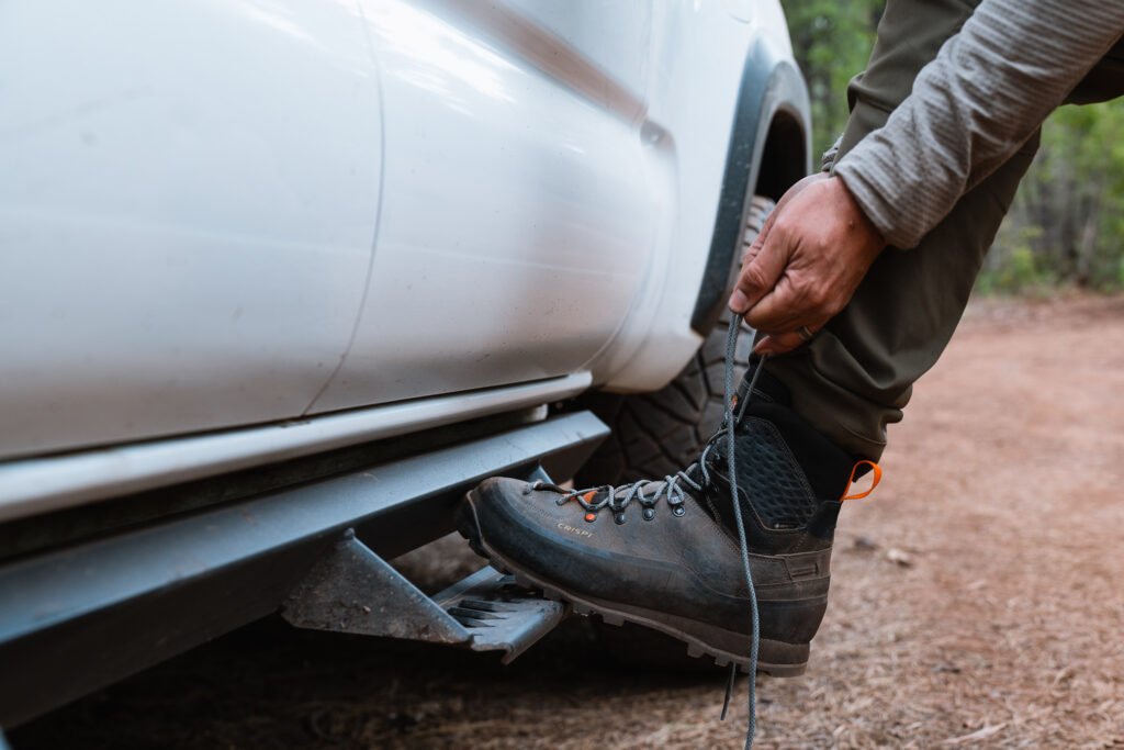 josh kirchner of dialed in hunter lacing up his crispi lapponia pro hunting boots