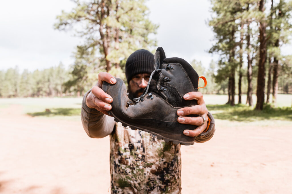 josh kirchner of dialed in hunter flexing the crispi lapponia pro hunting boots while in turkey camp