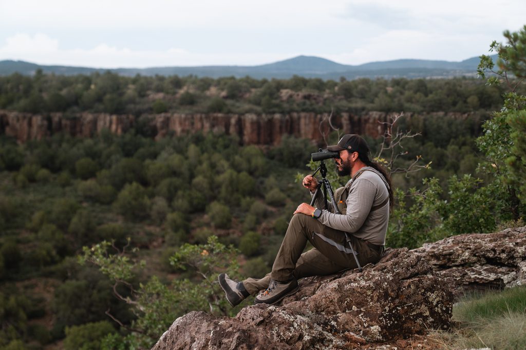 Josh Kirchner glassing for bears from a tripod